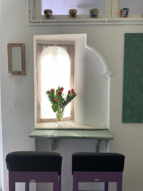Greenish Mamona's house